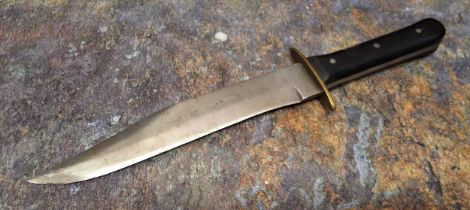 A 19th century bowie knife, with American black walnut grip, the blade inscribed Original Bowie