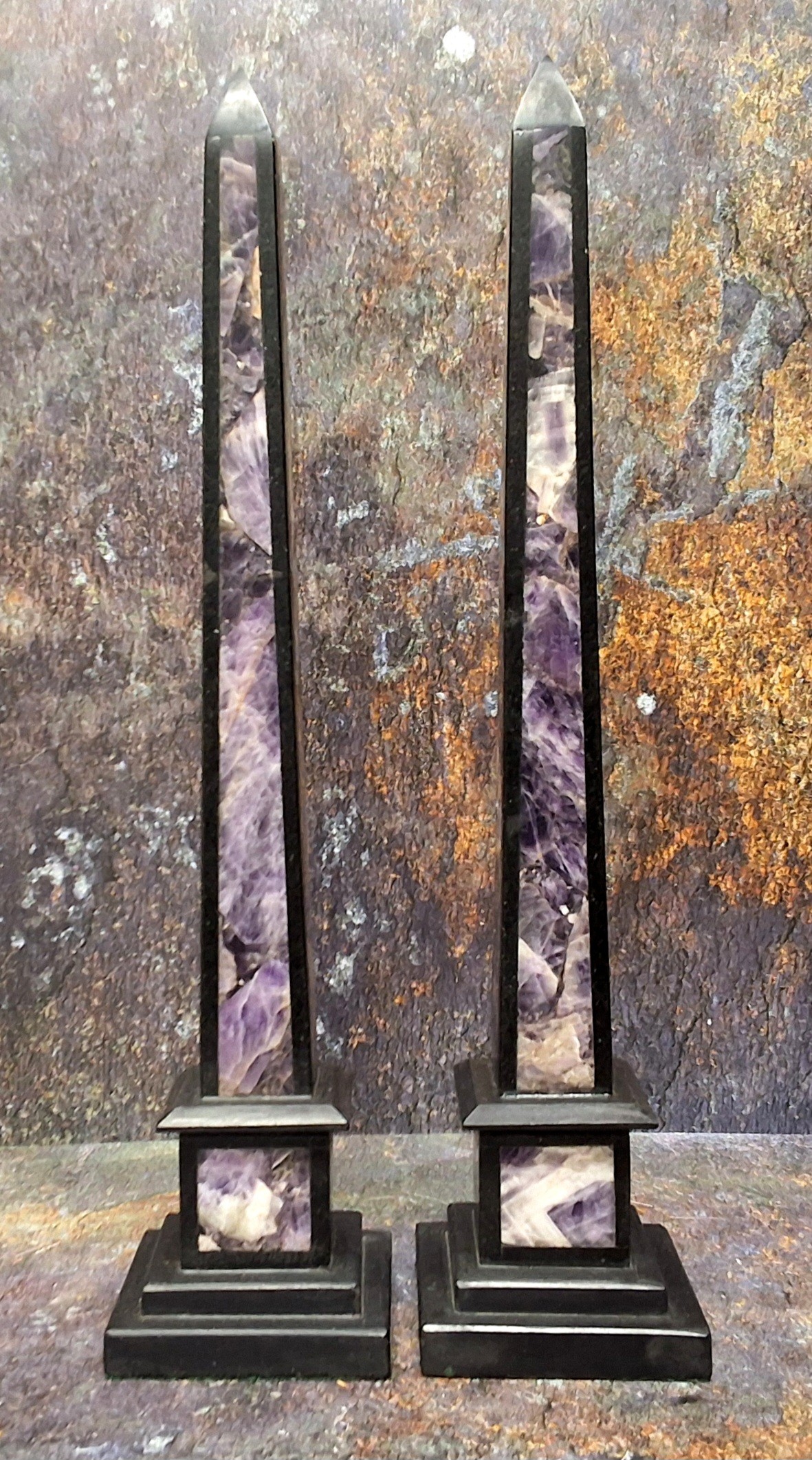 A pair of 'Grand Tour' type amethyst and black marble obelisks, 38.5cm high