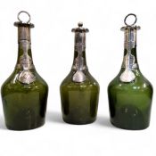 Masonic Interest  - A set of three 18th century green glass bottles, kick-up pontil bases, each