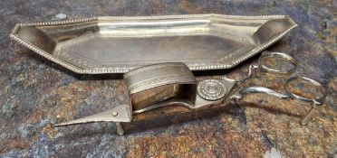 A George III Old Sheffield plate candle snuffer and navette shaped tray, gadrooned rim, 24.5cm wide,