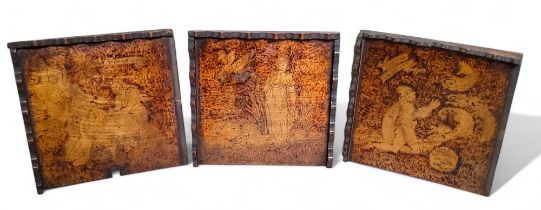 A set of three early 20th century penwork panels, decorated with Goose Girl, Frog Prince and