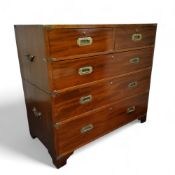 A 19th century mahogany campaign chest of two short above three long drawers, two sections, each