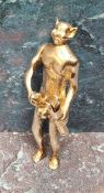 An early 20th century solid silver risqué novelty lighter, in the form a devil or demon with