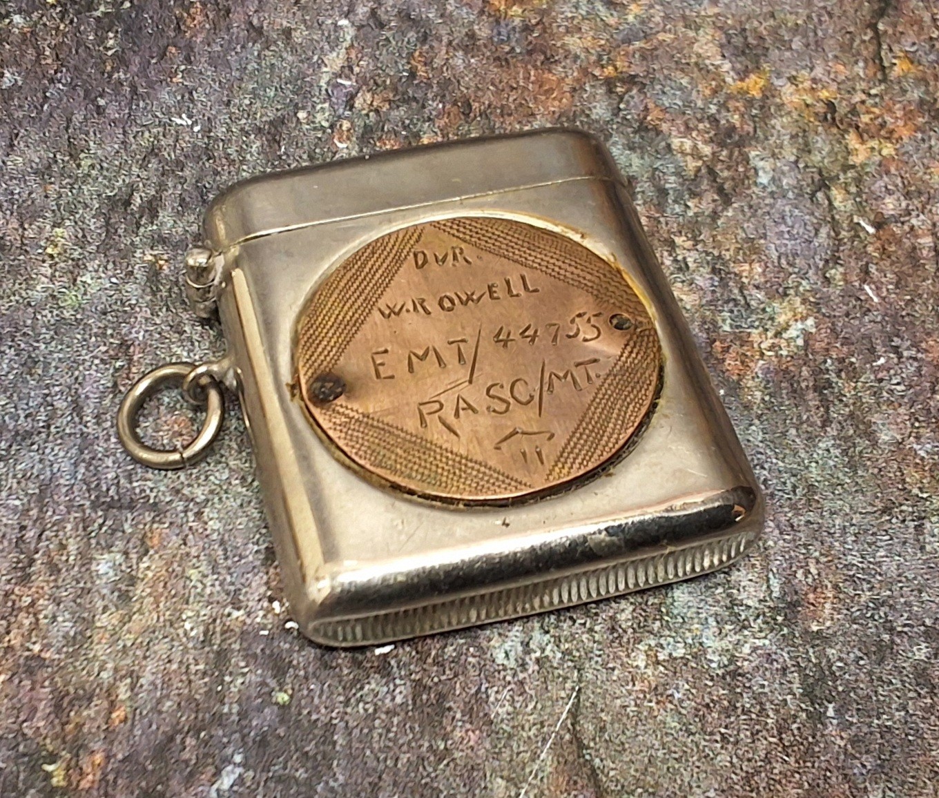 World War II - a military vesta case, set with a disc inscribed Driver W R Owell, EMT/44755, RASC/