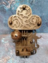 A French iron door lock, in the 17th century style, triform crest, pierced with scrolls and mystical