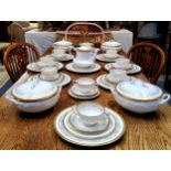 A comprehensive Coalport Viceroy pattern bone china dinner service, comprising nine dinner plates,