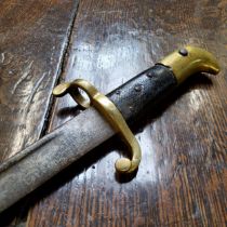 A British 1855 pattern Lancaster sword bayonet, brass pommel and cross guard with muzzle ring, black