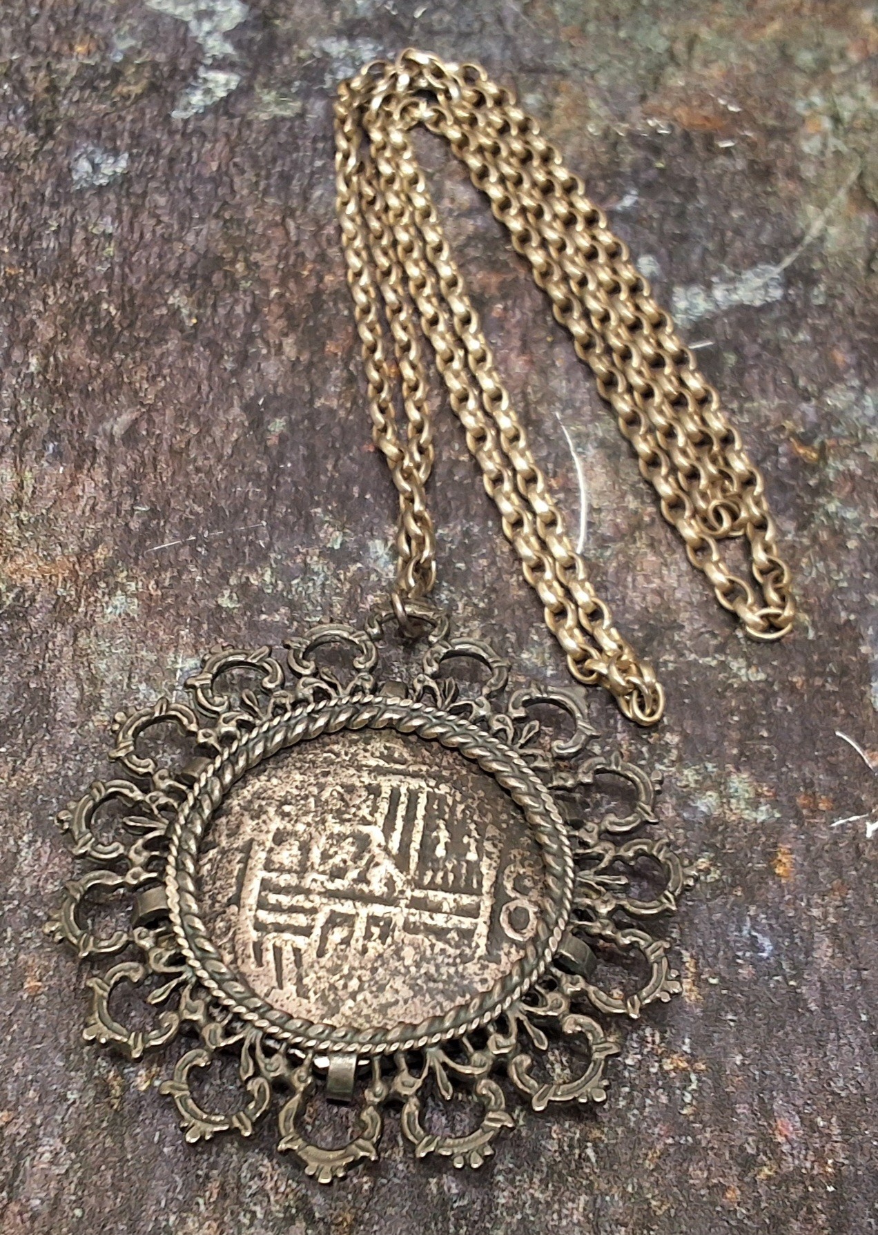 A Spink and Son Ltd. Lucayan Beach Pirate Treasure of 1628, a pendant mounted Mexcian 8 Reales coin, - Image 2 of 2