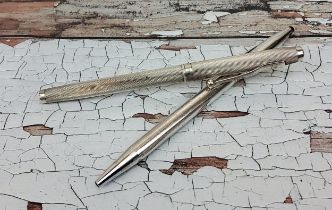 A silver Cross Classic Century ball pen; a Monarch silver engined turned ball pen and lid