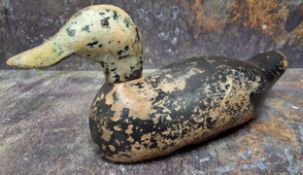 Folk Art -a North American/Canadian carved and painted decoy duck, naively painted with black head