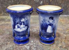 A pair of Royal Doulton Blue Children urnular vases, printed and painted in tones of blue with young