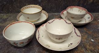 A Newhall tea bowl and saucer, decorated with stylised flower sprigs, pink trellis border, c.1800;