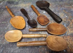 Six sycamore and other treen spoons, various sizes, 19th century