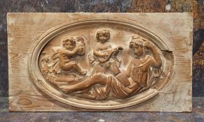 A 19th century carved panel, Allegorical of Music, 20cm x 38cm