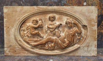 A 19th century carved panel, Allegorical of Music, 20cm x 38cm