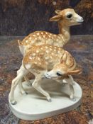 A Royal Worcester pre-production model of Fawns,  by Doris Lindner, oval base, 12cm high,  c. 1950