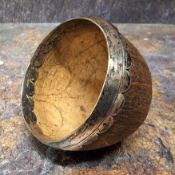 A 19th century silver mounted coconut cup, 9.5cm diam, c.1810