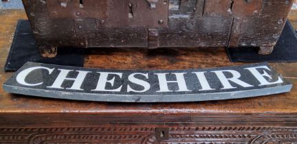 A CHESHIRE memorial plague fragment, carved black granite, letters painted in white, 64cm wide
