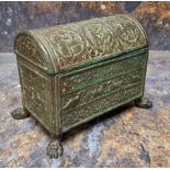 An early 20th century Renaissance Revival domed casket, cast with stylised animals, figures and