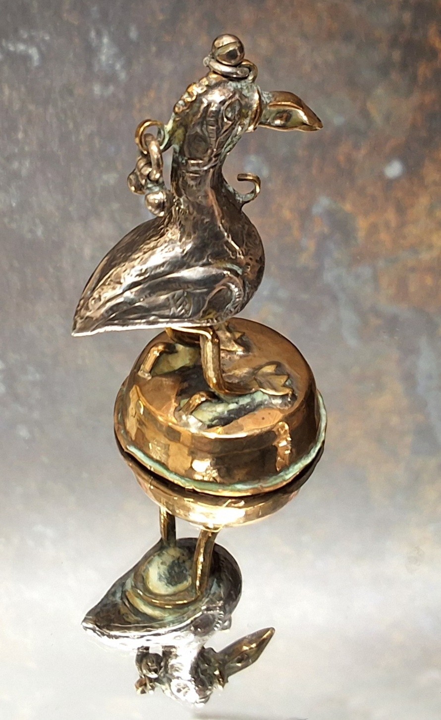 A Burmese plated opium weight, in the form of a bird, 6.25cm high, 19th century - Image 2 of 2