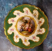 A Meissen shaped circular plate, the field painted with Europa and the Bull, within gilt foliate