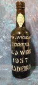 A bottle of D'Oliveiras Reserva Old Wine Madeira, 1957, 70cl, Selo de Garantia Madeira No.637697,