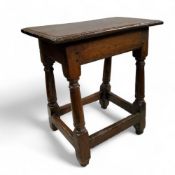 An early 17th century oak joint stool, 52cm high, 48cm wide, 28cm depth.