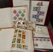 Stamps- a carton containing all world stamps in four binders and a number of stamps loose or in