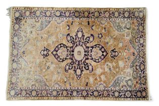 A 19th century Persian silk rug, the central panel  with floral medallion,  in blue, red and