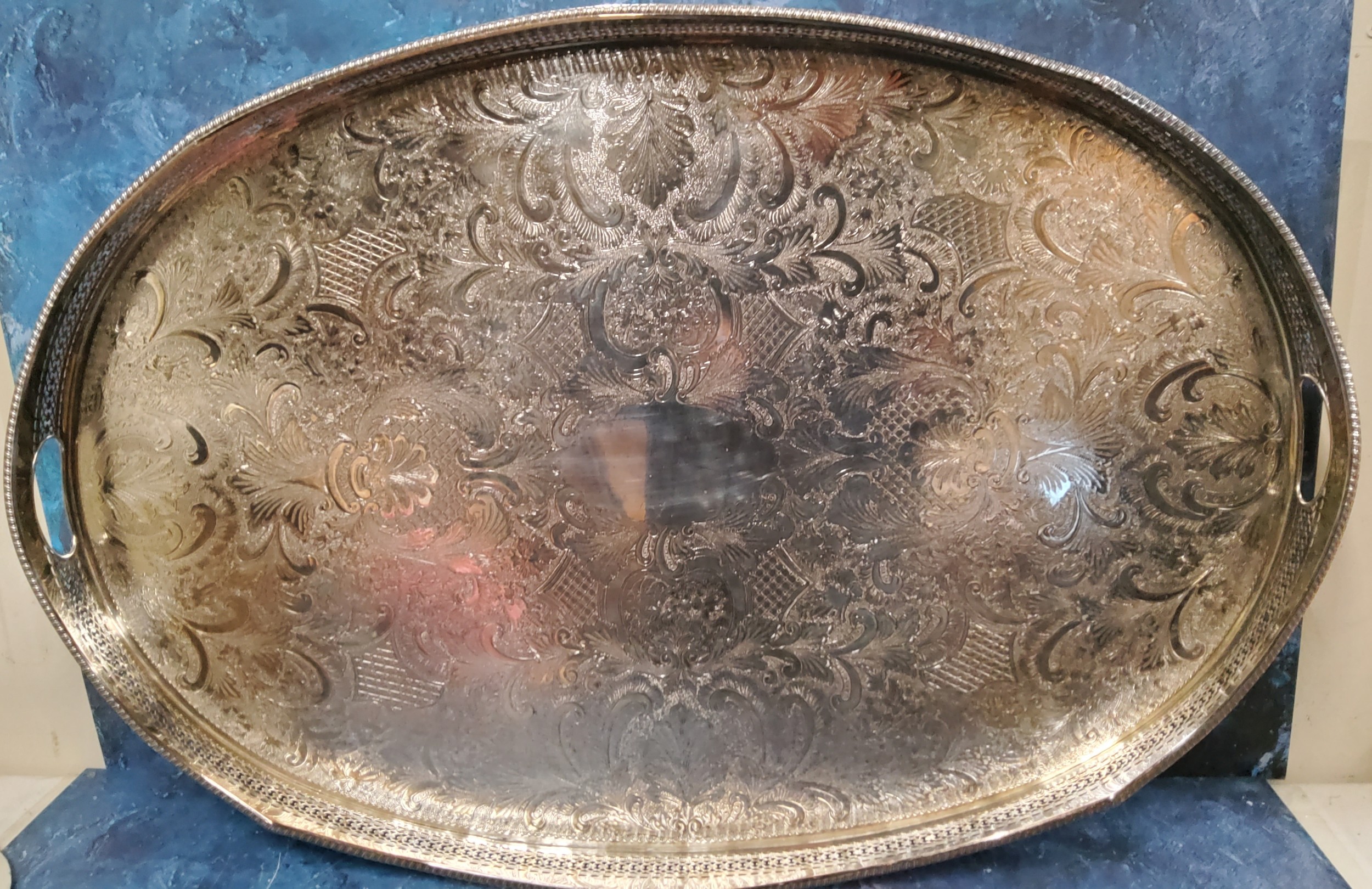 A large E.P. on Copper oval gallery tray, the field die stamped with foliate scrolls, gadrooned rim, - Image 2 of 2