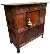 A William & Mary oak livery cupboard