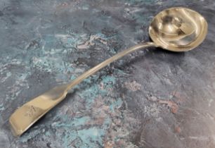 A George IV silver fiddle back ladle, dragon crest, Clement Cheese, London, 1829, 34cms 209g