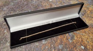 An 18ct gold diamond diamond tennis bracelet, claw set with approx. 84 round diamonds, approx. total