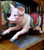 Fairgound Art - a 19th century carved and polychrome painted carousel figure, of a pig, glass