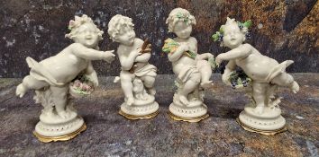 A set of four Capo-di-mote figure, Allegorical of the Seasons, signed C Calle, each with scantilly