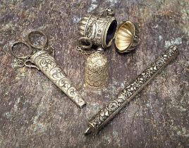 A Victorian silver chatelaine thimble case, half fluted and embossed with scrolls, suspension chain,