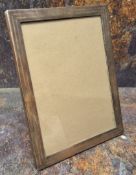 A George V silver rectangular easel photograph frame, engine turned in bands, 22.5cm x 18cm,
