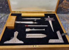A silver plated Masonic Lodge tool set, by Toye & Co, comprising various tools, ruler,  gavel,