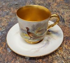 A Royal Worcester demi-tasse cup and saucer,  painted by James Stinton signed, with a brace of