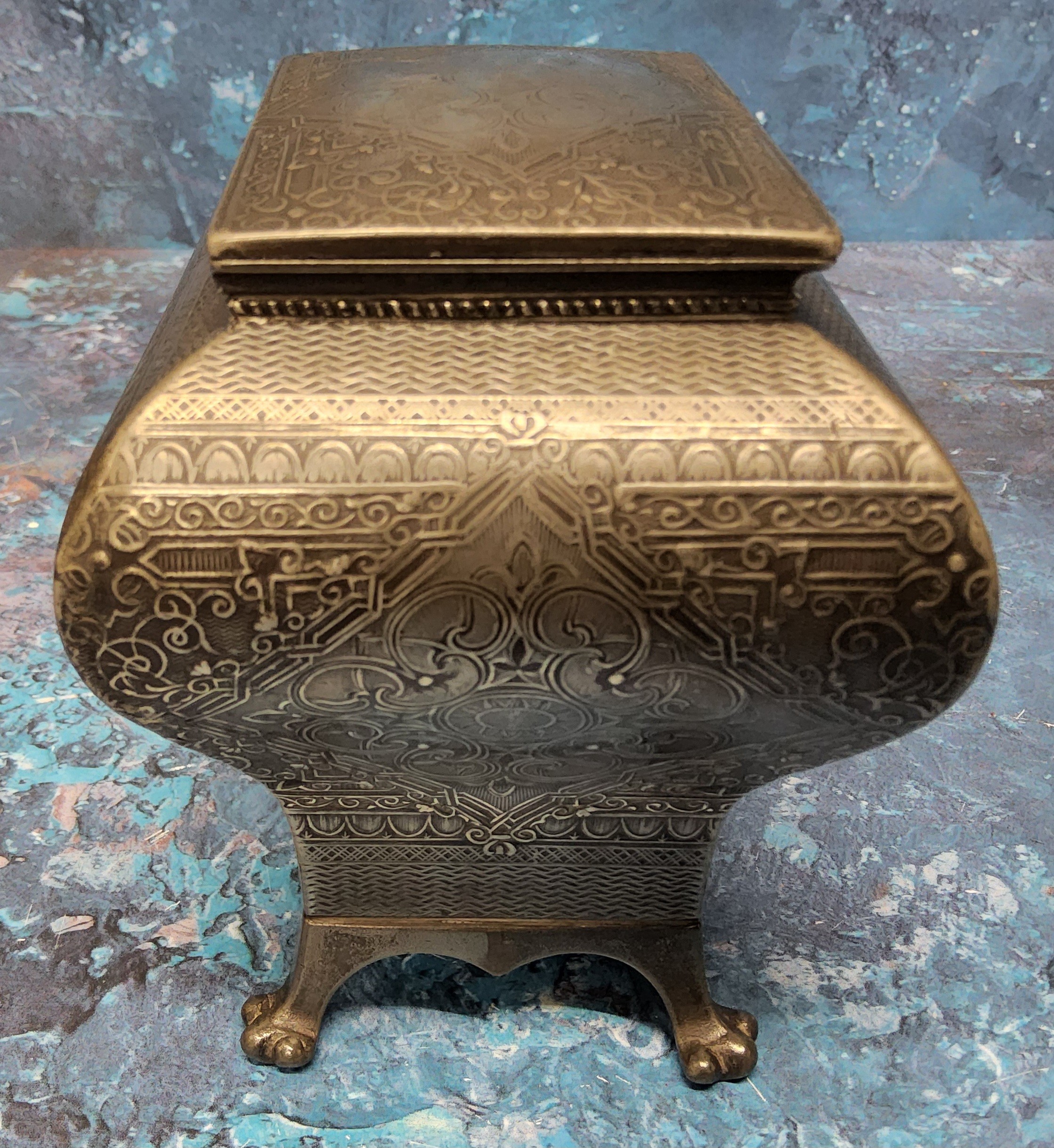 A late 19th century pewter bombe tea caddy,  engraved with foliate scrolls within a basket weave - Image 2 of 5