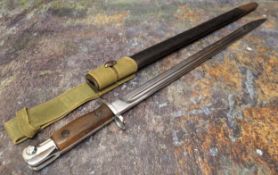World War I, a British Pattern 1907 bayonet,  42cm fullered steel blade, two-piece wooden grip,