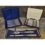 A silver three piece Kings pattern carving set, Sheffield 1971, boxed;  a set of six silver hafted