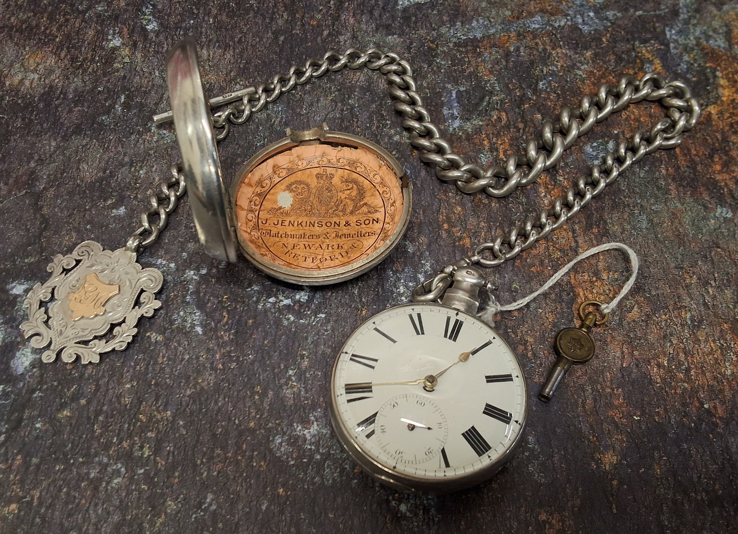 A silver pair cased pocket watch, inscribed James Edge 1829, with key; a silver Albert chain and - Image 2 of 3