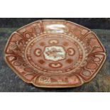 A Japanese Kutani shaped circular dish, the field painted with mystical beast, the sides with