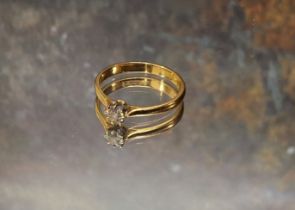A yellow metal & diamond solitaire ring, claw set round diamond, approx. 0.25ct, size Q 1/2, 3.1g