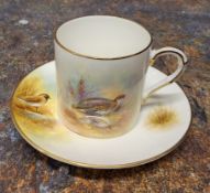 A Royal Worcester coffee can and saucer, painted by P. Platts, signed, with Ptarmigan and Golden