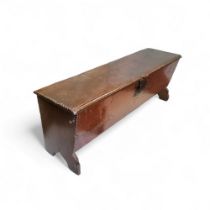 An early 17th century English six plank elm sword box,