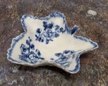A Bristol leaf shaped pickle dish, painted in underglaze blue with three floral sprays,  moulded