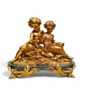 French School, late 19th century, gilt bronze sculpture of two children with a bird's nest, green