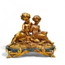 French School, late 19th century, gilt bronze sculpture of two children with a bird's nest, green